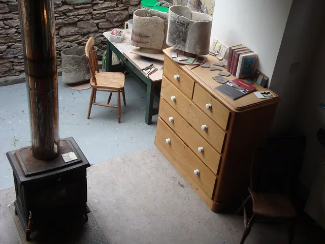 Cill Rialaig Artist Residency Village, County Kerry - Studio Interior 2, Cottage No7; about 17, May 2011 (with ceramic work in progress; leather-hard vessels on worktops and one on floor - Oratory Vessels I, II & IV; test-tiles, tools, books). Artist residency grants in Canada: funders and real costs